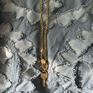Beautiful key gold colored necklace